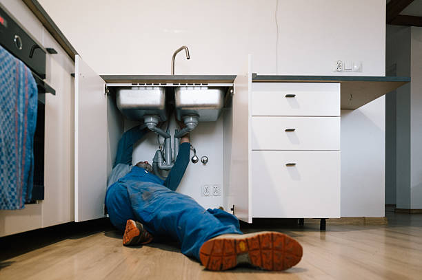 Professional Emergency Plumber technician working in Fall River, MA